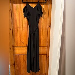 Monteau scallop, black jumpsuit with sexy open flare leg